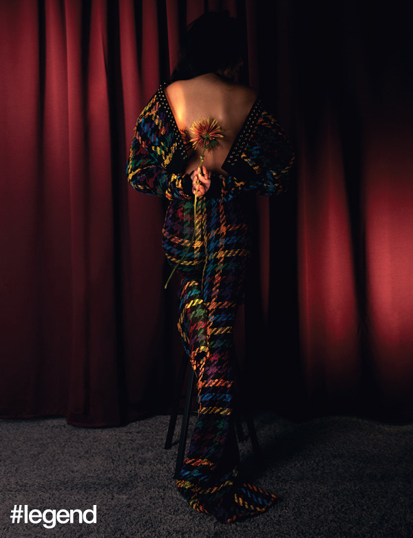 Gaile Lok wears outfit by Balmain 